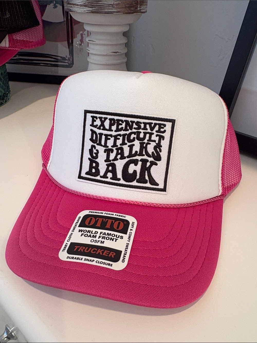 OTTO Pink & White trucker Hat with 'Expensive Difficult & Talks Back' Patch